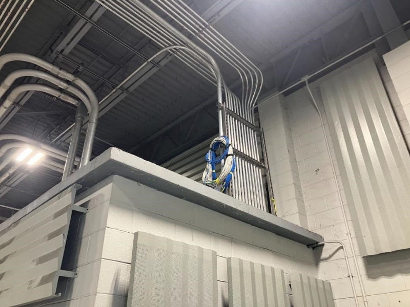 A new conduit in the sludge building with cables pulled